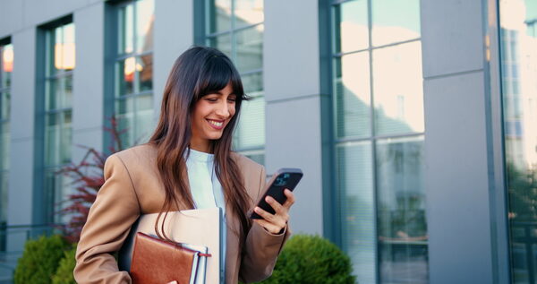Professional confidently returning to work after a career break