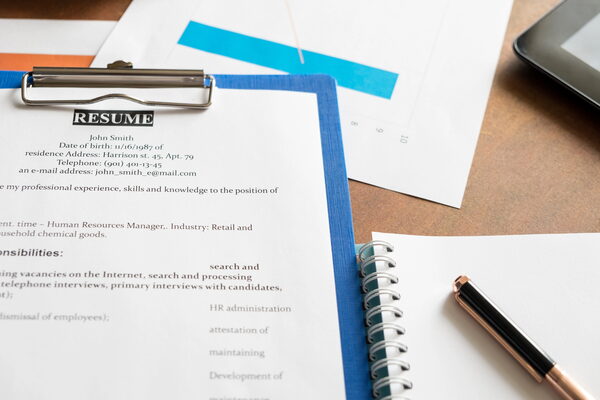 Professional resume documents laid out on a desk